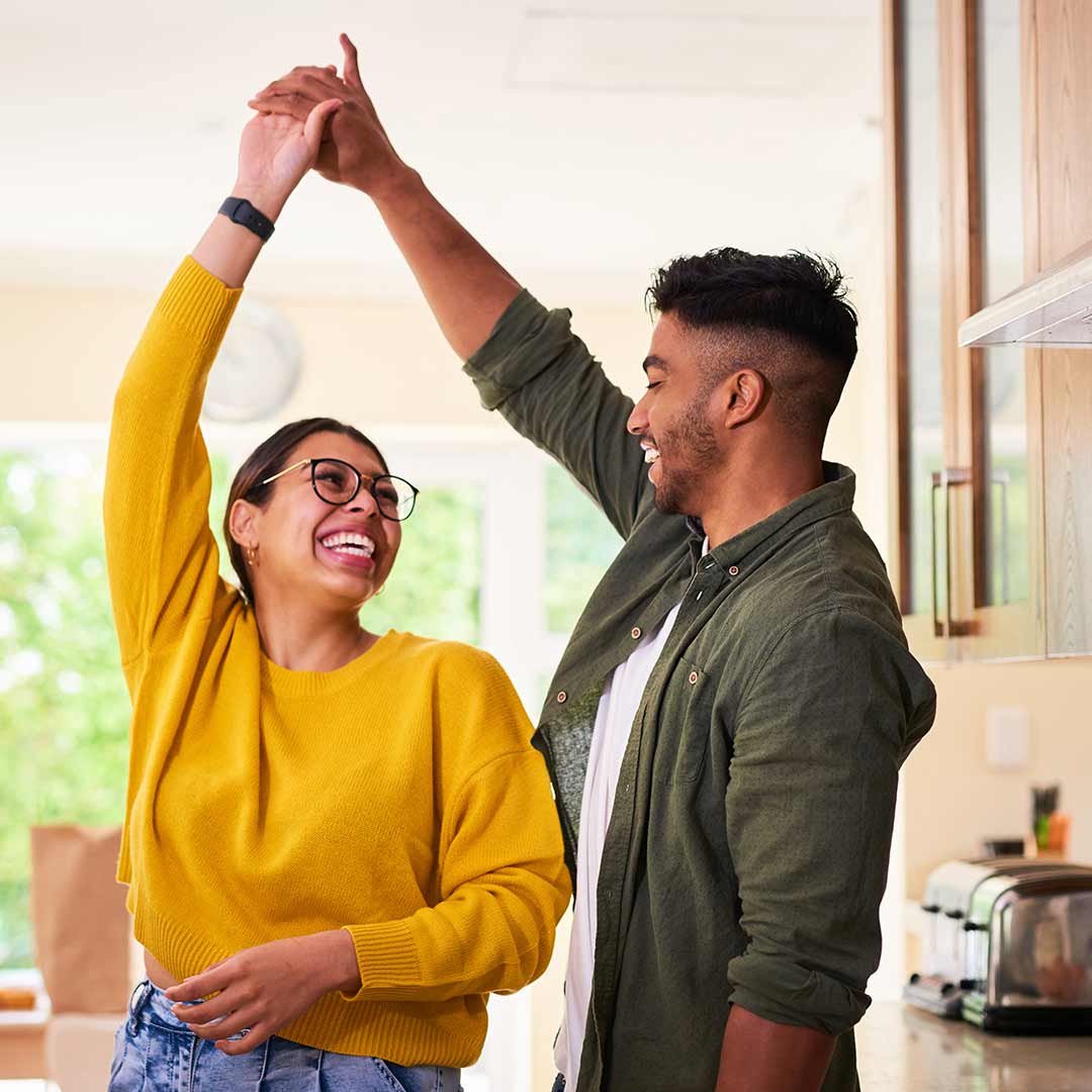 couple dancing in the livingroom