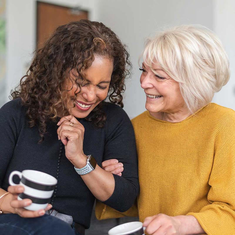 older friends talking and laughing